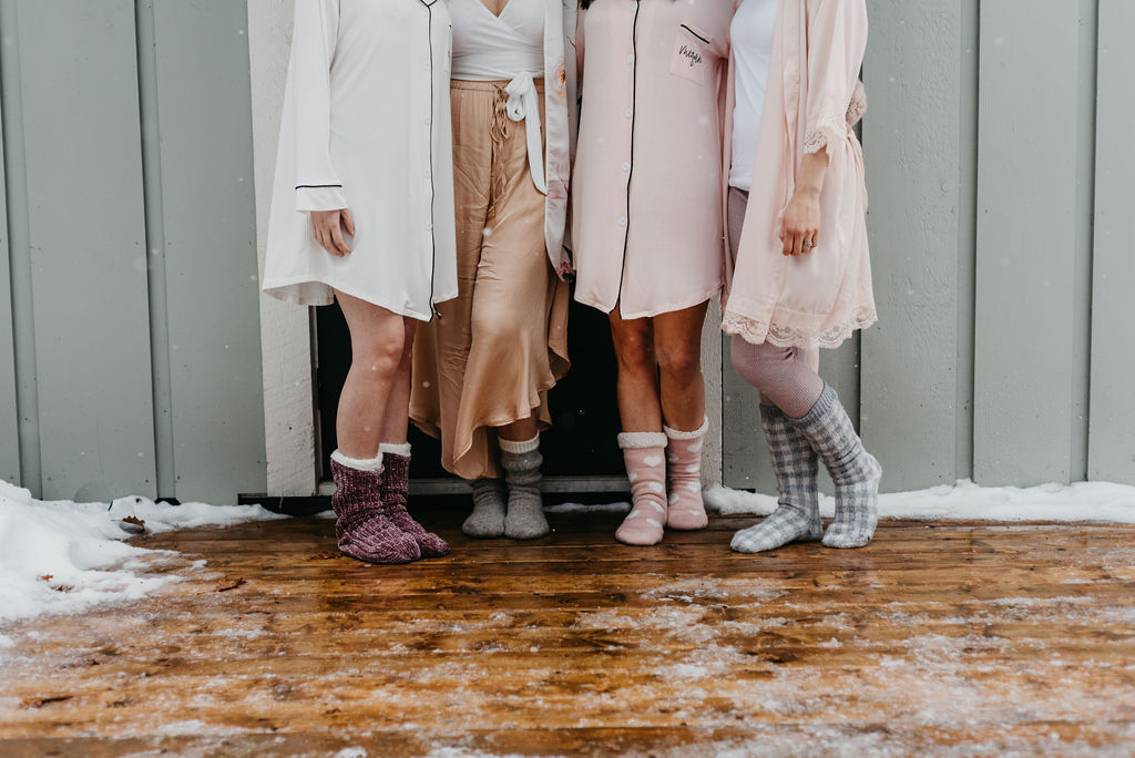 Bachelorettes wearing cozy winter socks to finish off their outfits.